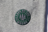 Green and grey embroidered logo on grey LOTW Gear fitted sweatpants