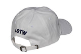 Side view of white LOTW GEAR dad hat with navy blue embroidered logo