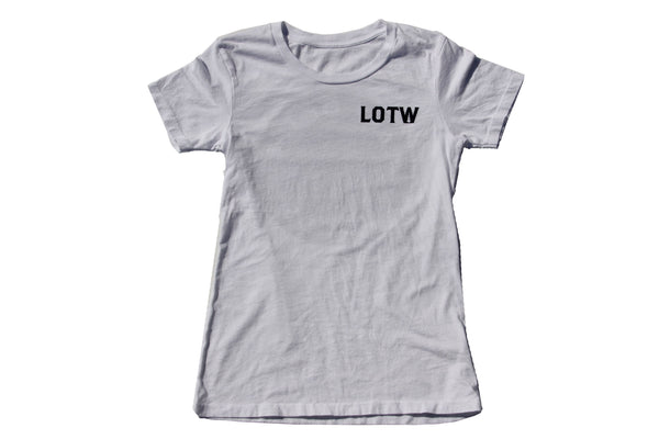 Front of womens LOTW Gear white t-shirt with small LOTW logo on left chest
